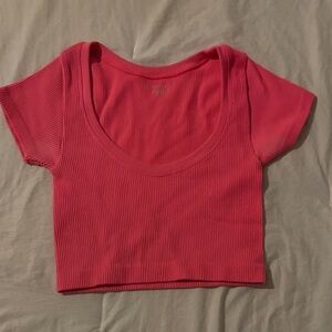 Aerie Offline bright pink ribbed pink crop top.